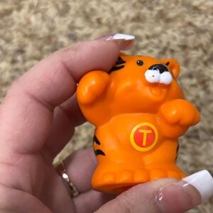 Fisher-Price Little People A-Z Learning Zoo playset. 
Letter T